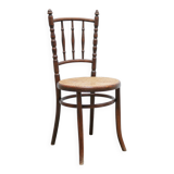 Chaise bistrot cannée ancienne en bois par les éditions Fischel