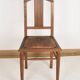 Chaise style Art Déco en bois sculpté et cuir.
