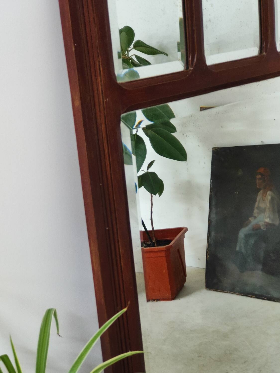 Antique beveled mirror on a wooden frame, 1930