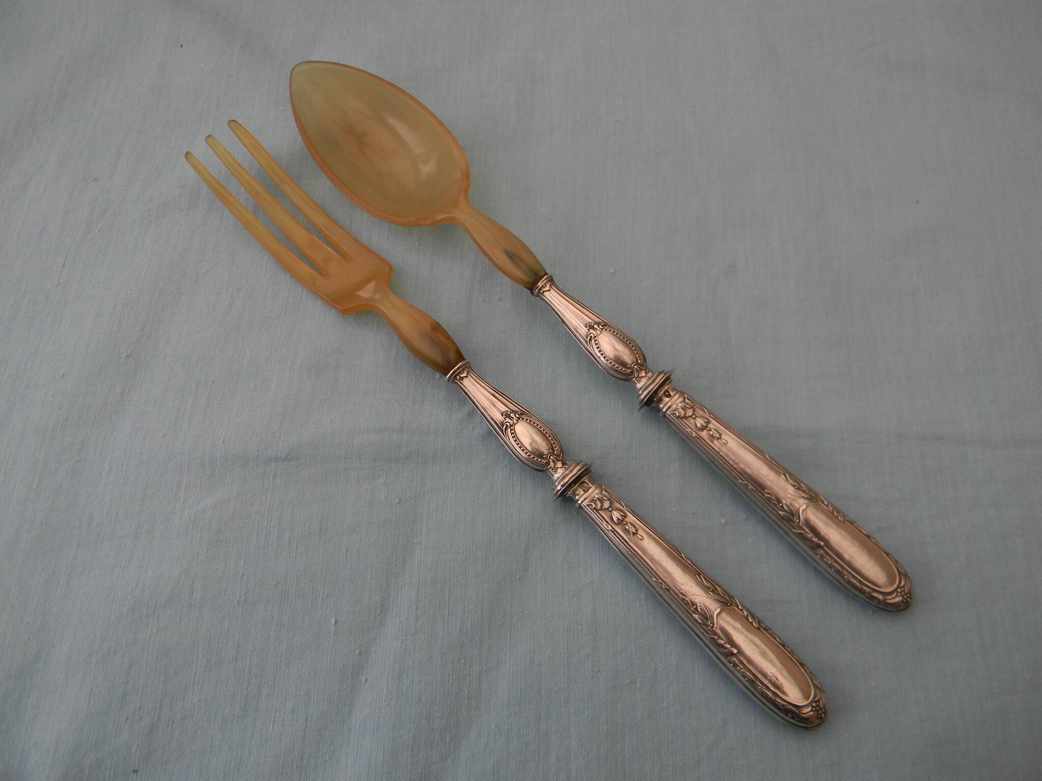 Salad cutlery with silver-filled handles. Minerva hallmark.