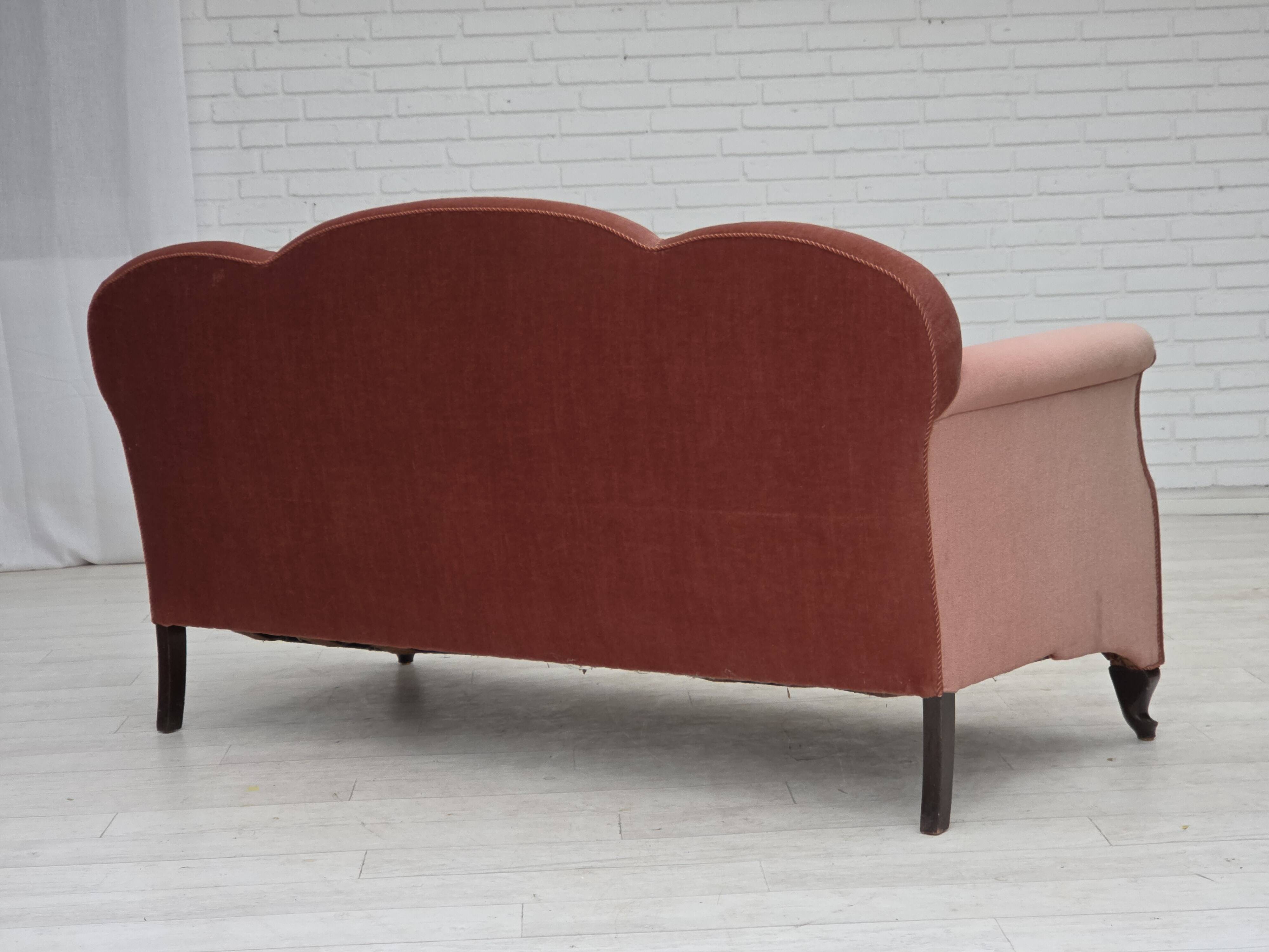 1950s, Danish 2-seater sofa, salmon pink furniture velour, oak wood legs.