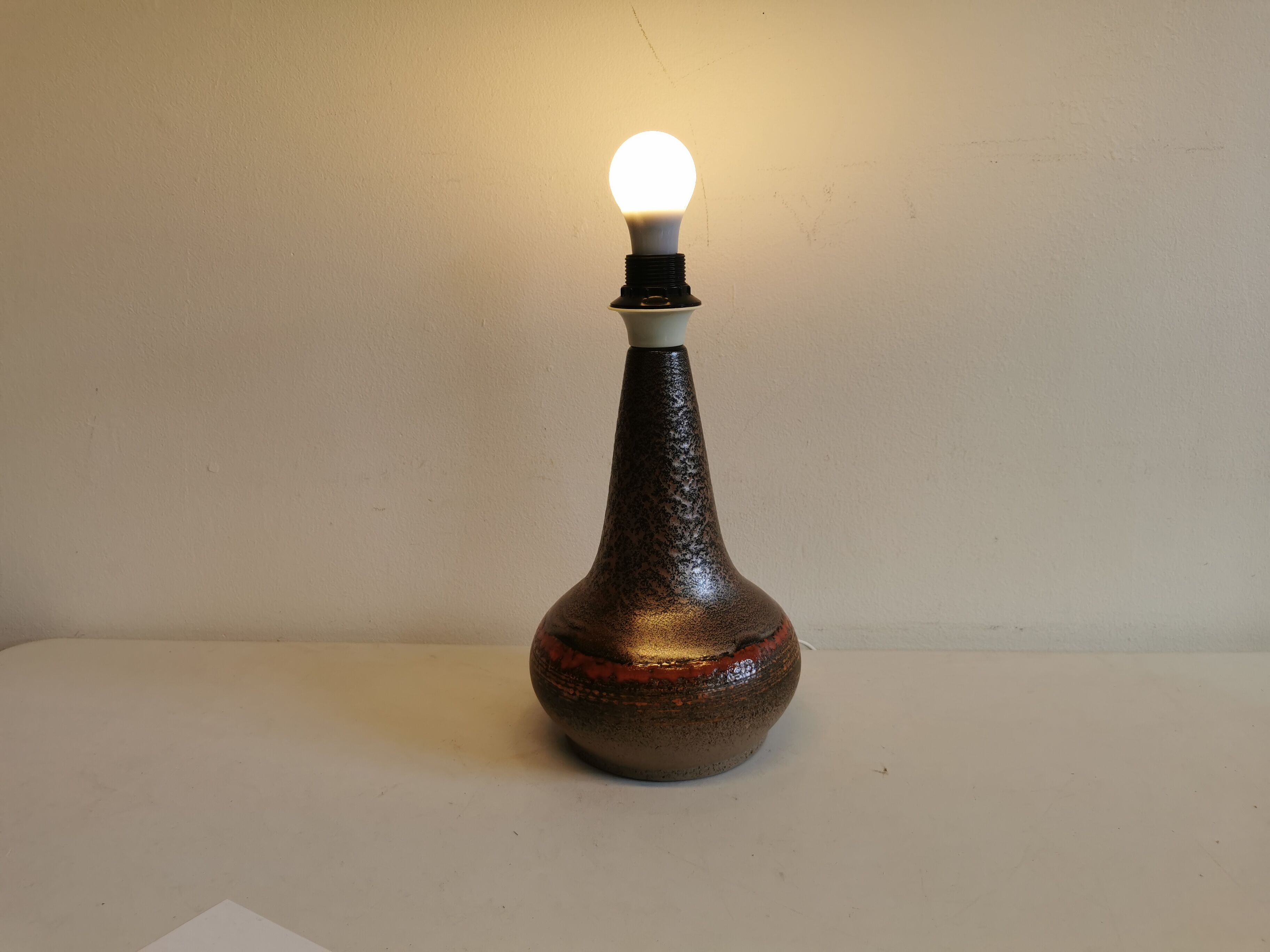 Swedish ceramic table lamp in metal glaze, from Tilgmans, estimated 1960s.