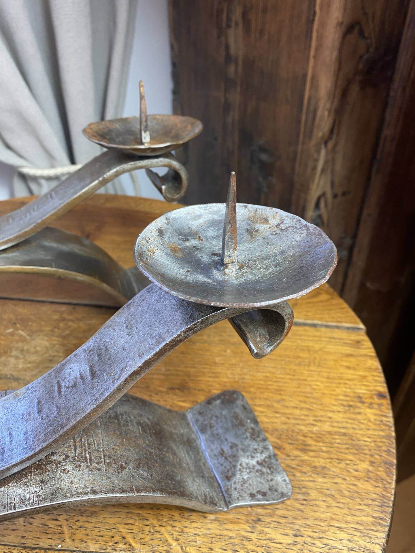 Brutalist wrought iron candlestick pair