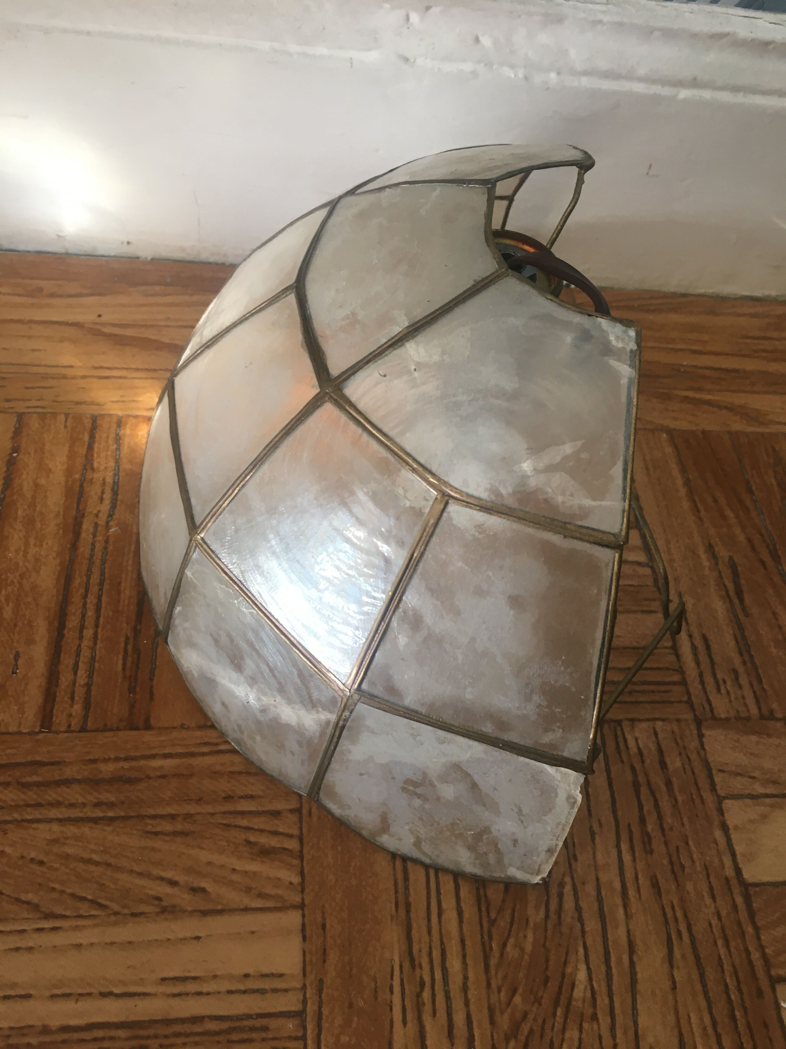 Mother-of-pearl and tin wall lamp