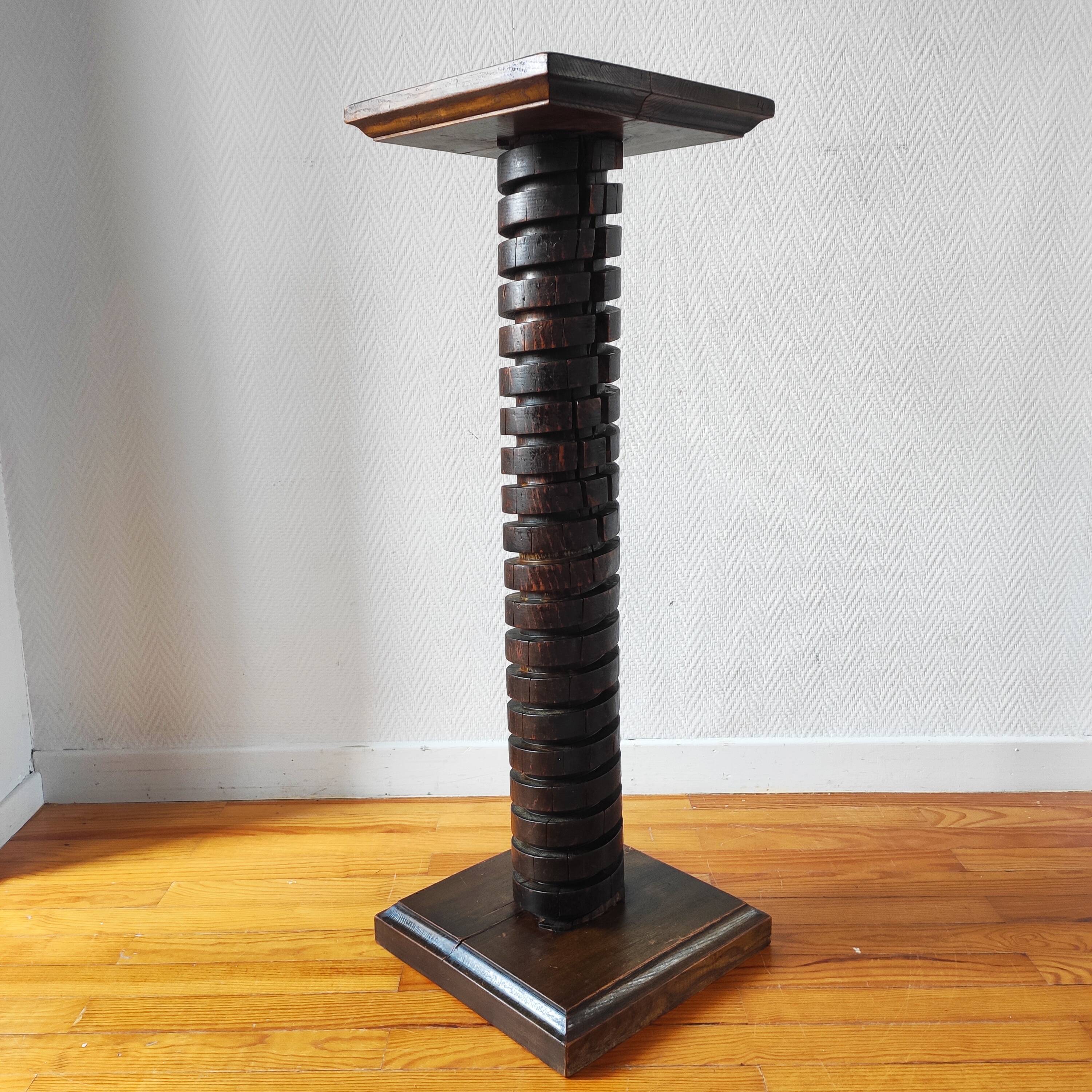 Brutalist column – old Burgundy press screw