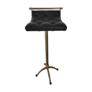 Tabouret en cuir capitonné