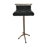 Tabouret en cuir capitonné laiton