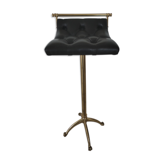 Tabouret en cuir capitonné laiton