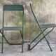 Pair of folding metal chairs, military or industrial, mid-20th century.