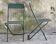 Pair of folding metal chairs, military or industrial, mid-20th century.