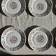 Set of 6 vintage dessert plates made in Poland with a plant motif.