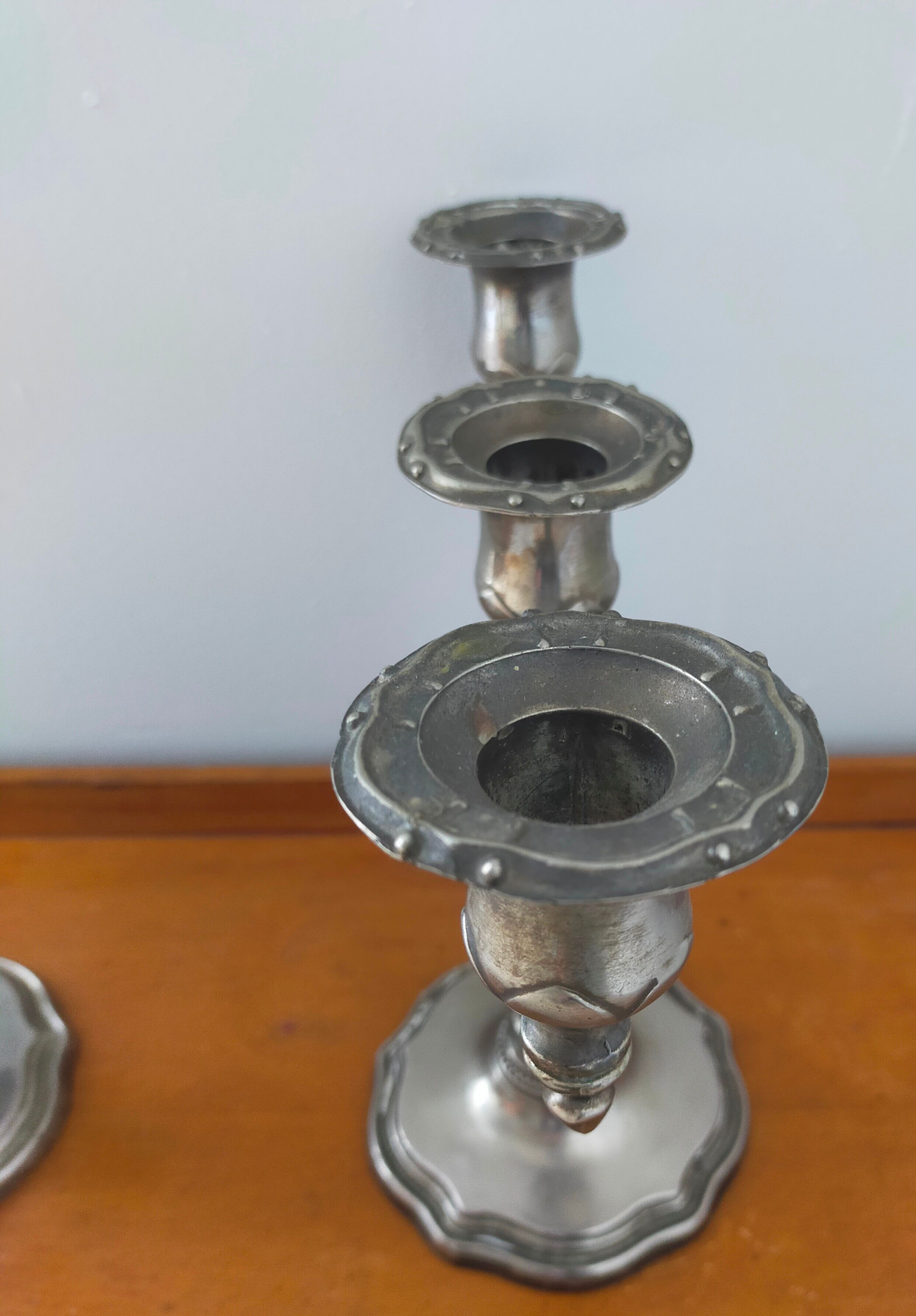 Pair of silver metal candlesticks