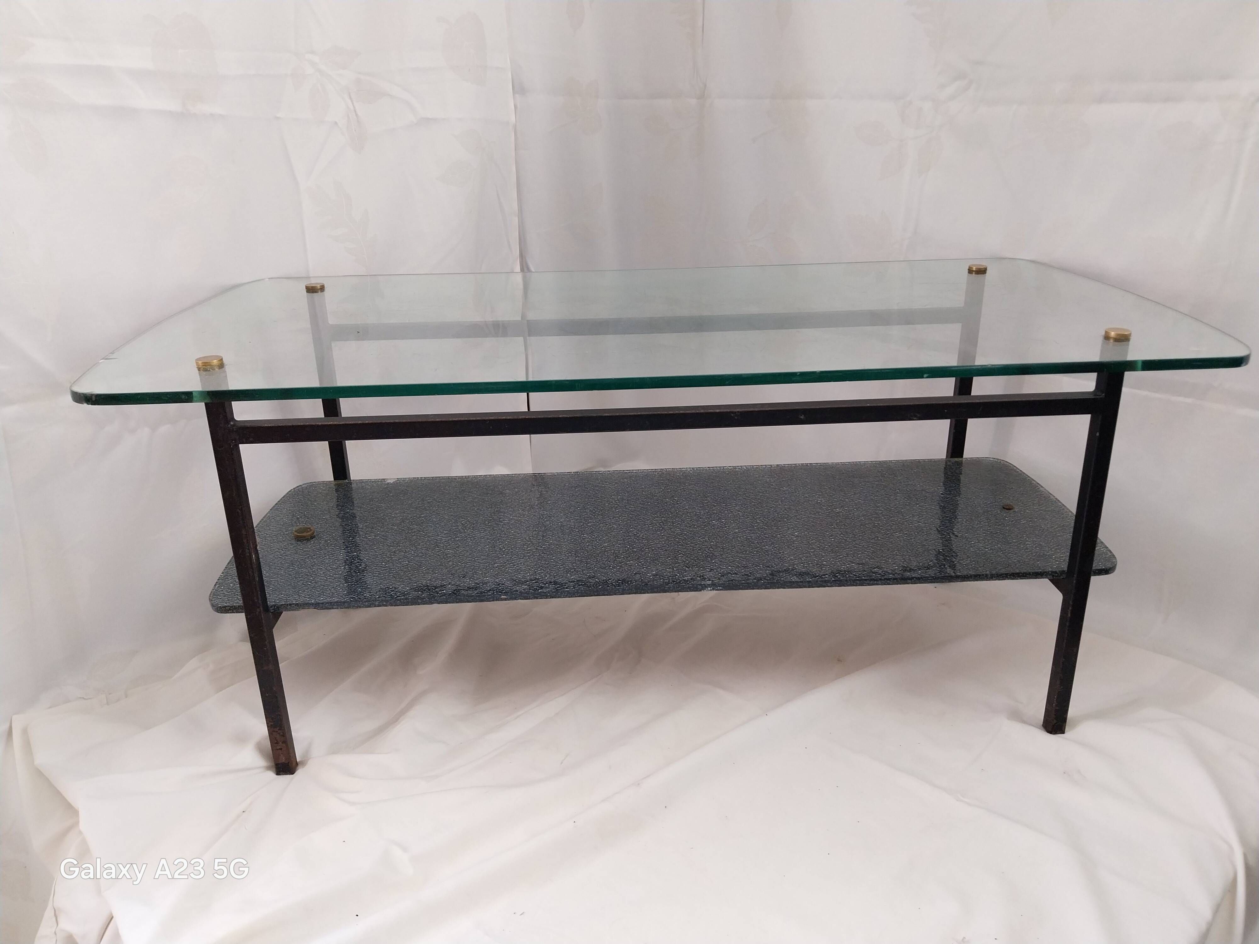 Modernist coffee table with double glass top and black metal - 1950s.