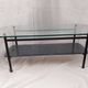 Modernist coffee table with double glass top and black metal - 1950s.