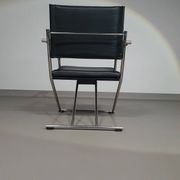 2 chaises pliantes en cuir chromé