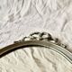 Louis XVI style oval metal wall mirror