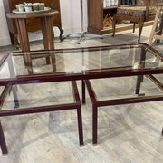 Burgundy lacquered metal, brass and beveled glass nesting tables, France 1950s