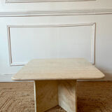 Square coffee table in travertine.