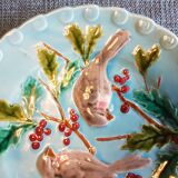 Assiette en barbotine à décor d'oiseaux