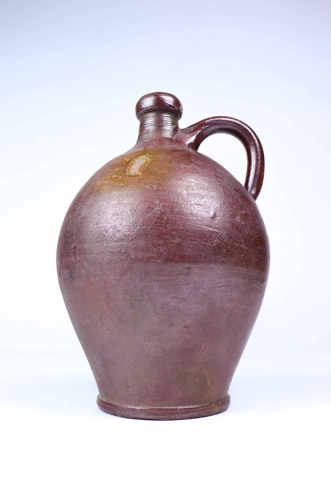 Old enamelled stoneware jug