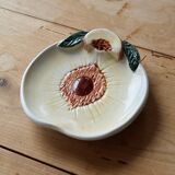 Small vintage barbotine bowl with peach-shaped pattern