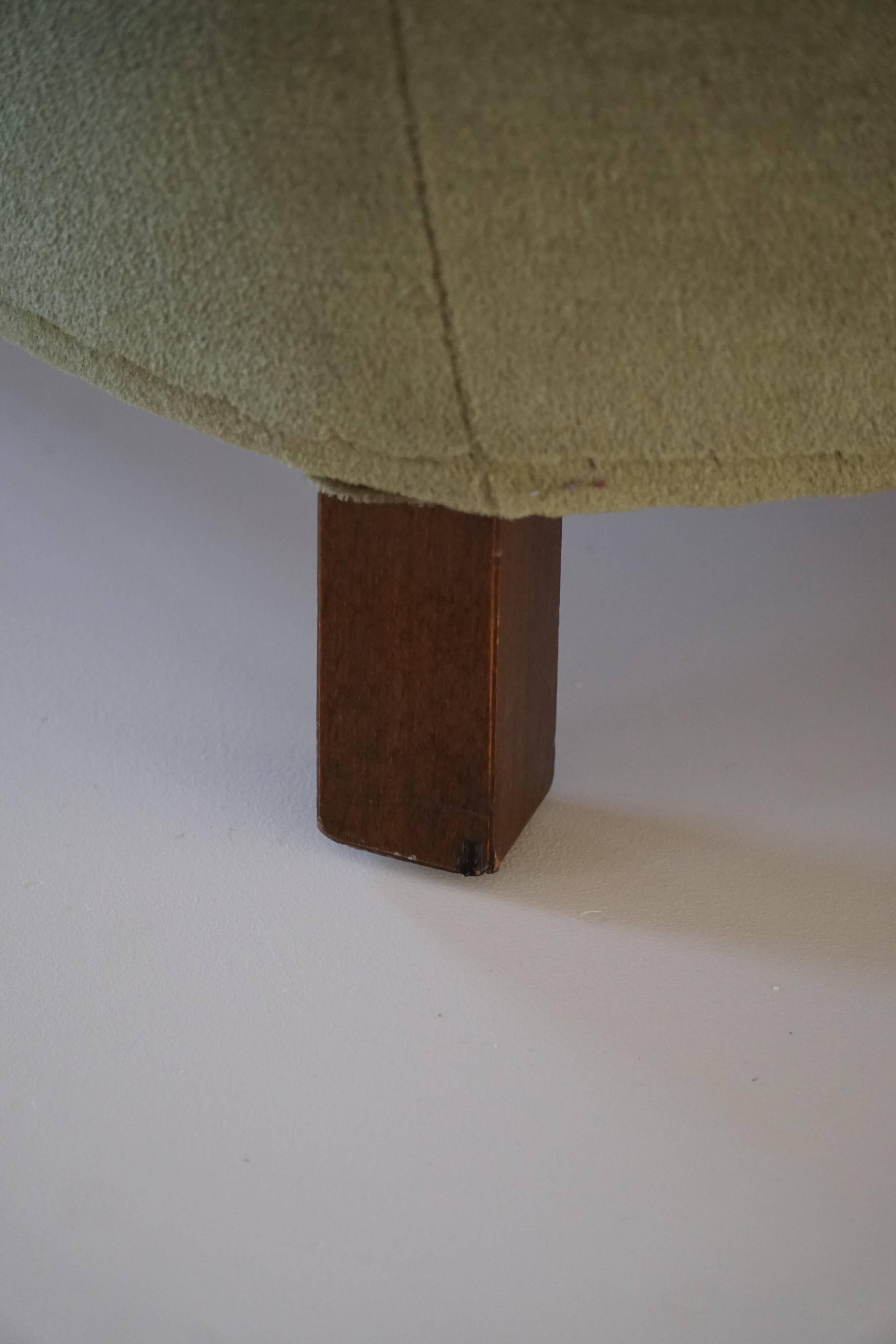 Curved Danish club chair from the mid-century, in the style of Viggo Boesen, 1940s.