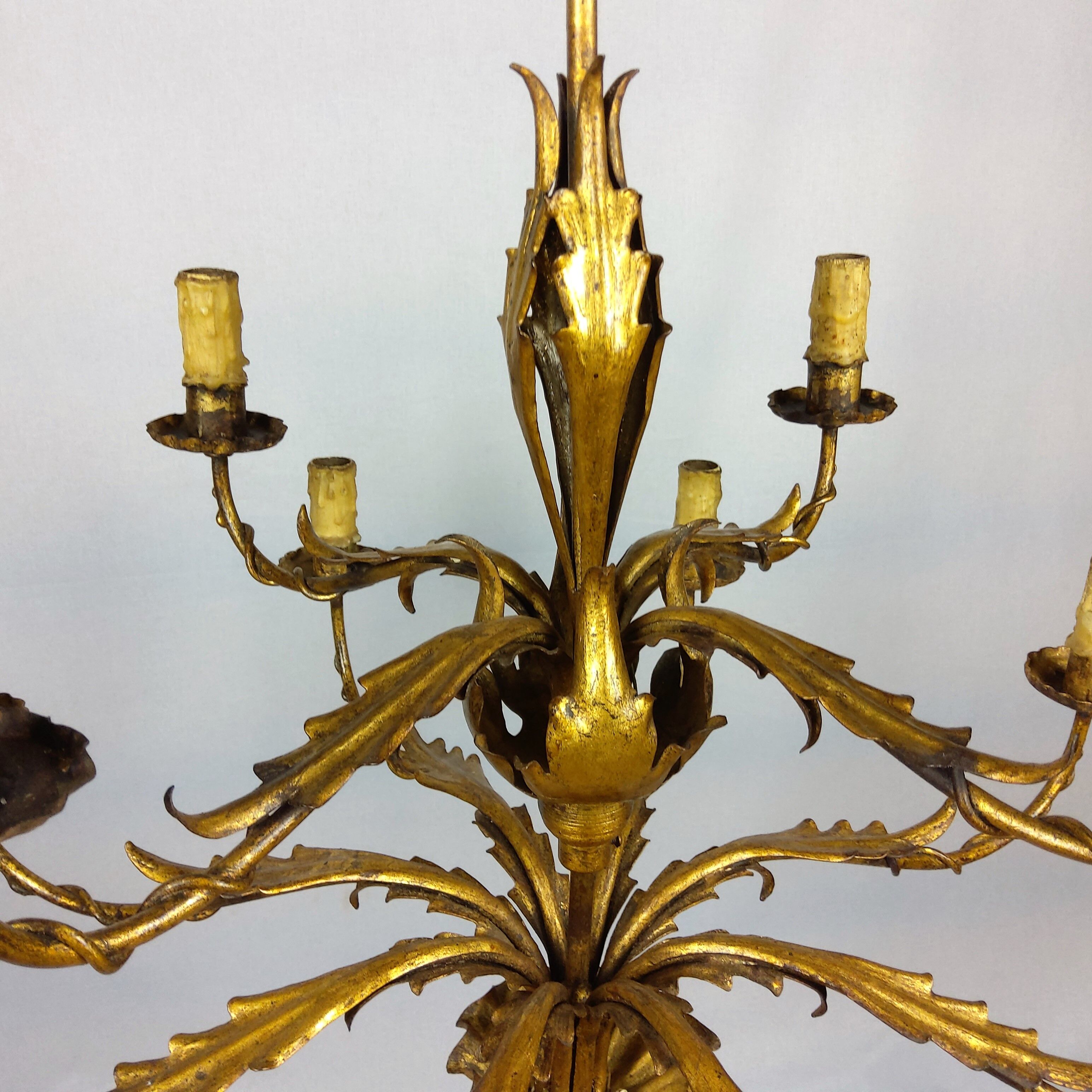Golden luster with 12 arms of light decorated with leaves 1940