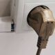 Adjustable swing arm modernist floor lamp