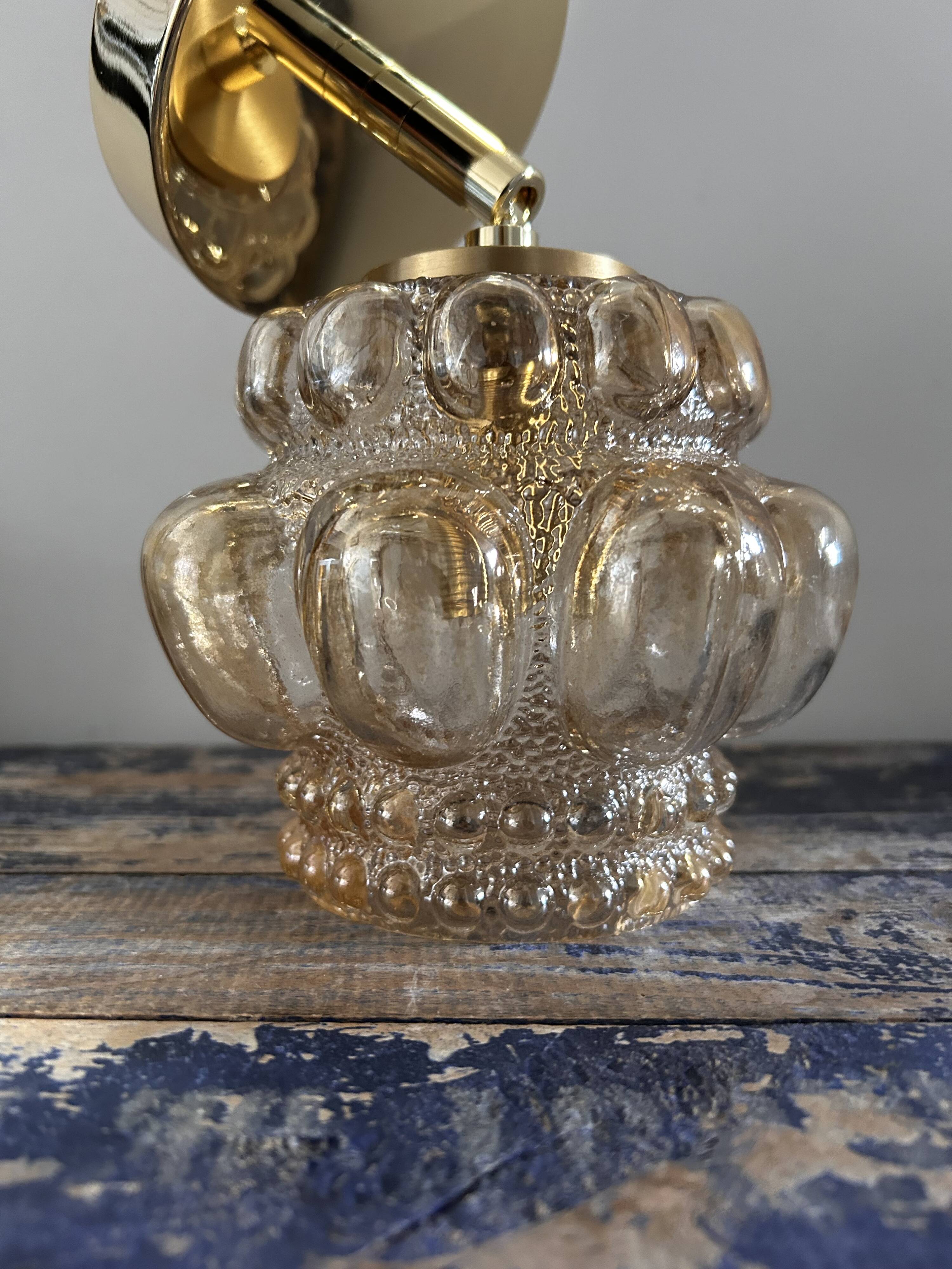 Bubbled glass wall light