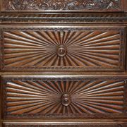 19th-century Anglo-Indian colonial hardwood library on a chest of drawers.