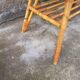 Rattan coffee table with compass legs