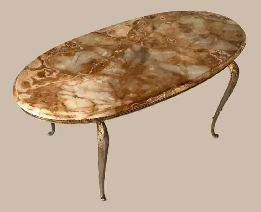 Oval coffee table in onyx and brass 1950