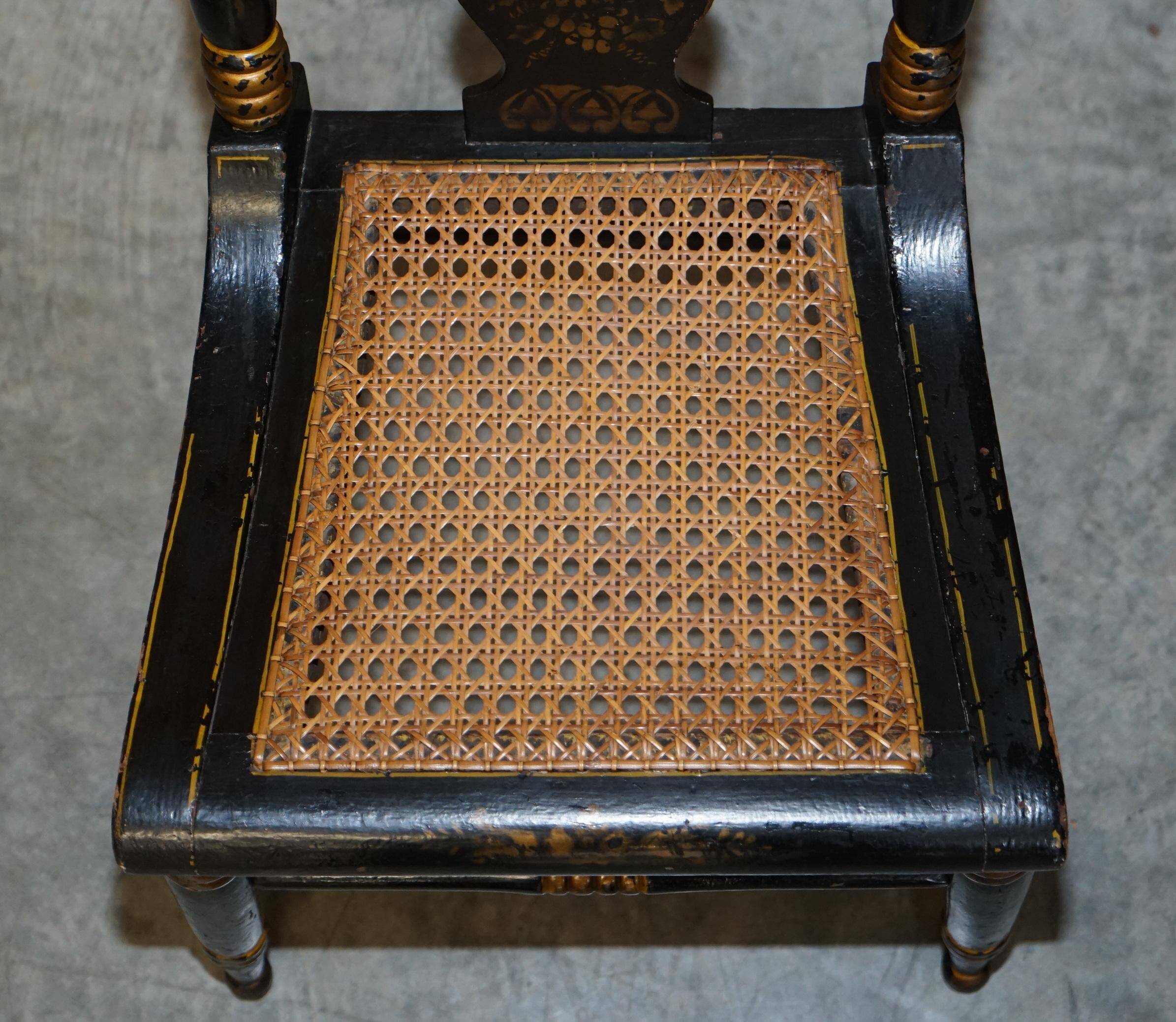 Georgian side bergère circa 1825, ebonised and hand-painted in Baltimore style.