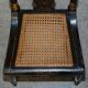 Georgian side bergère circa 1825, ebonised and hand-painted in Baltimore style.