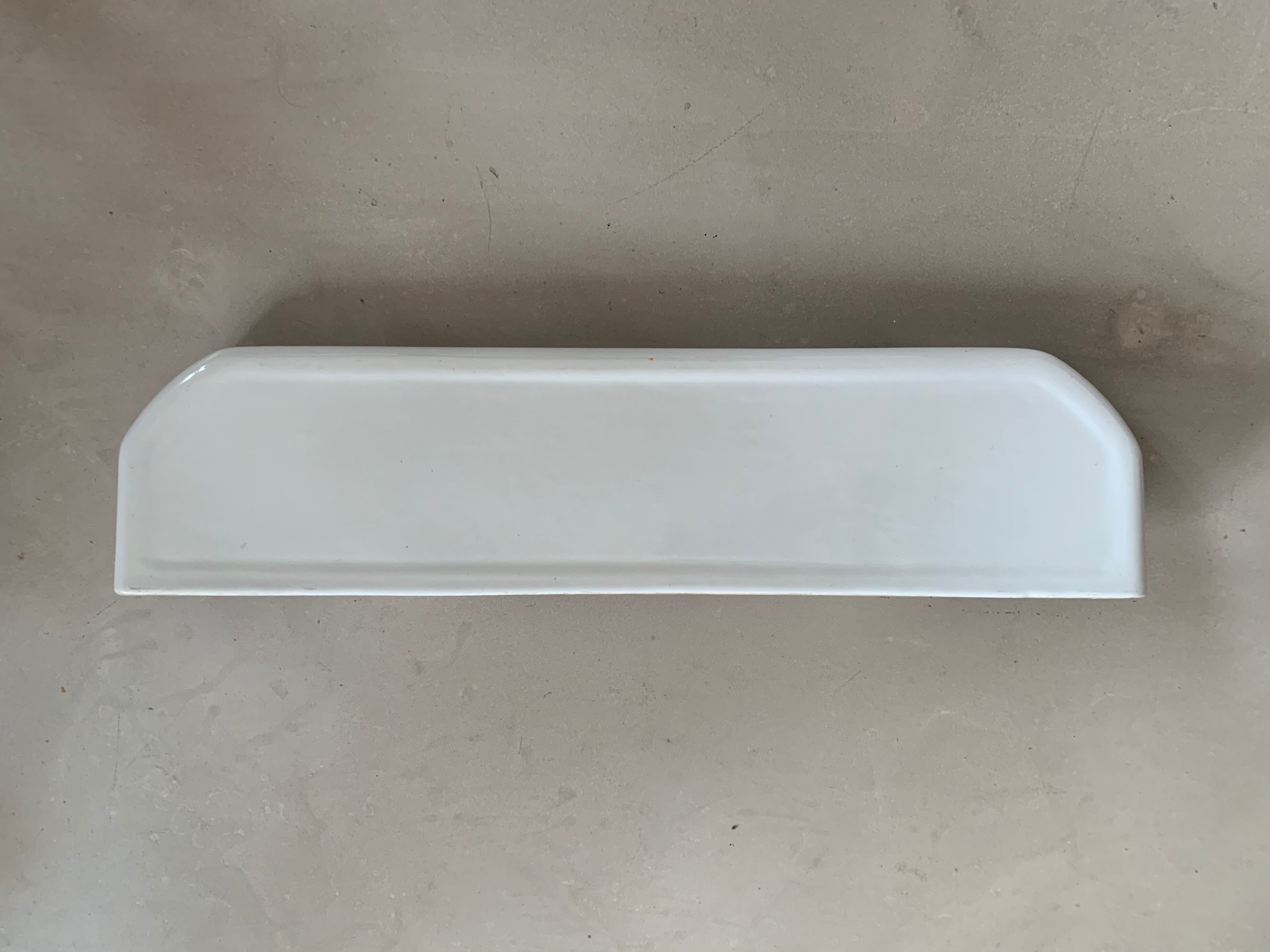 Antique ceramic wall shelf