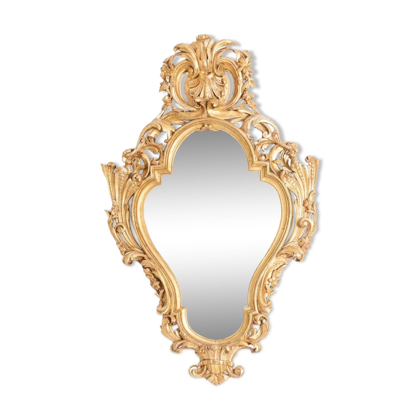 Regency style mirror in carved and gilded wood. 1950s.