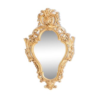 Regency style mirror in carved and gilded wood. 1950s.