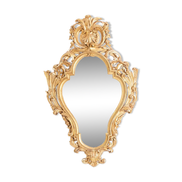 Regency style mirror in carved and gilded wood. 1950s.