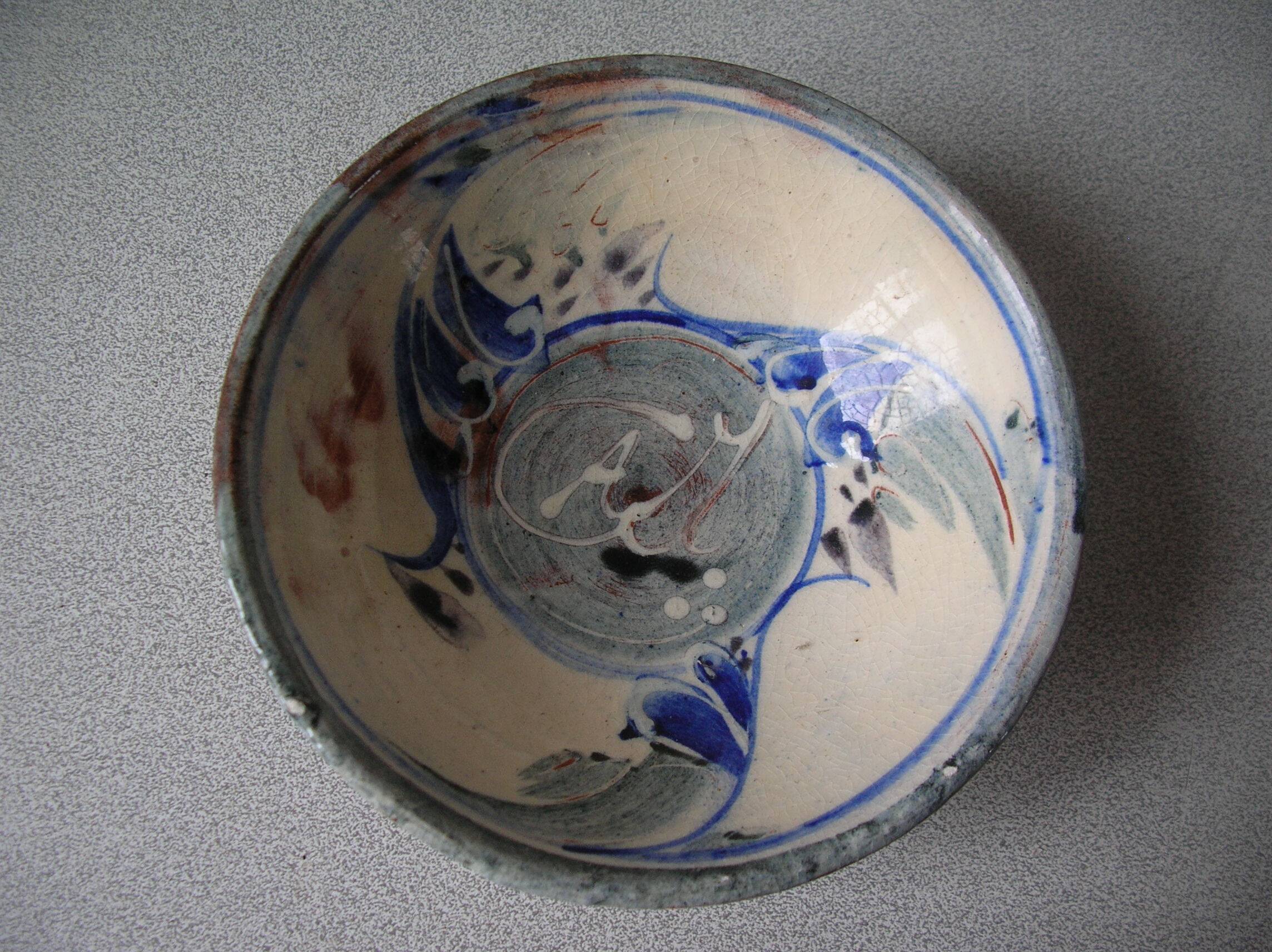 Old small bowl in enamelled terracotta, old earthenware