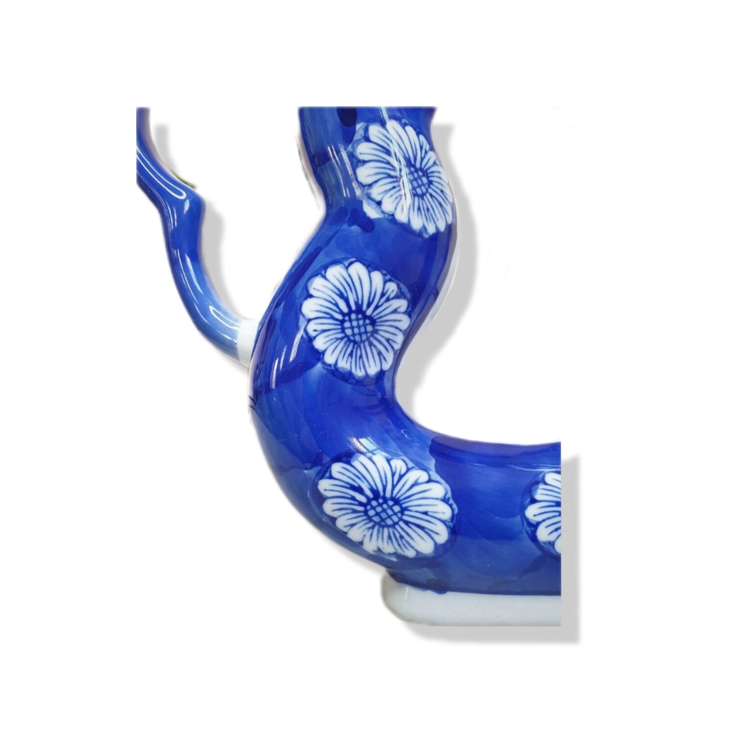 Old Asian teapot in toroidal shape in blue porcelain with floral decoration 20th century