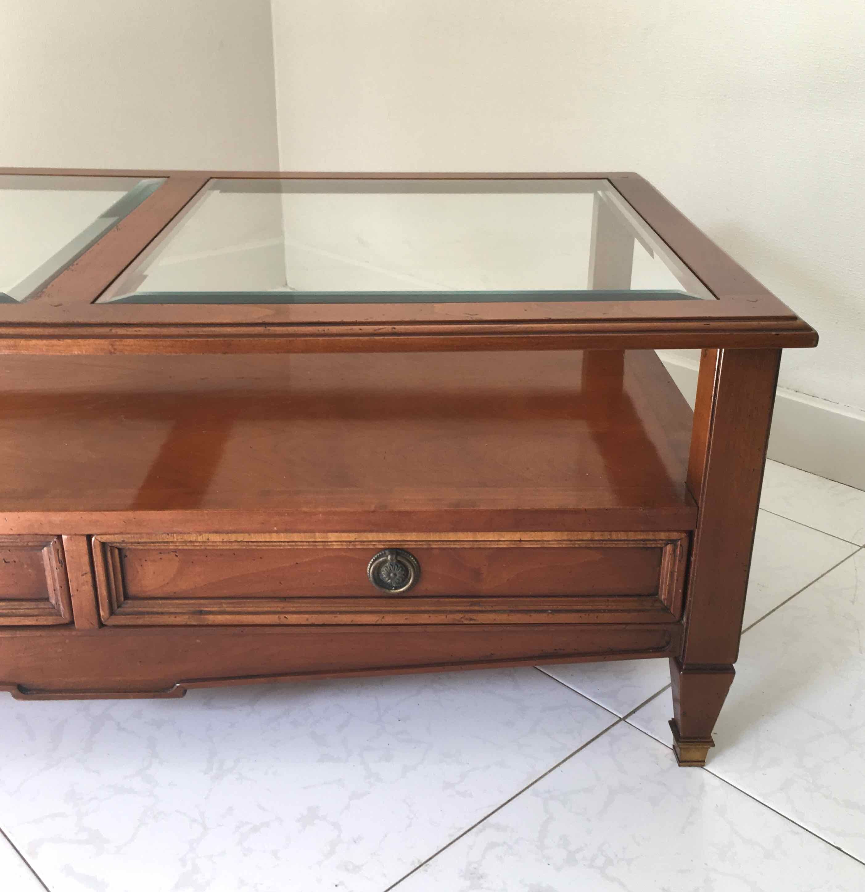 Coffee table with cherry drawers and beveled glass