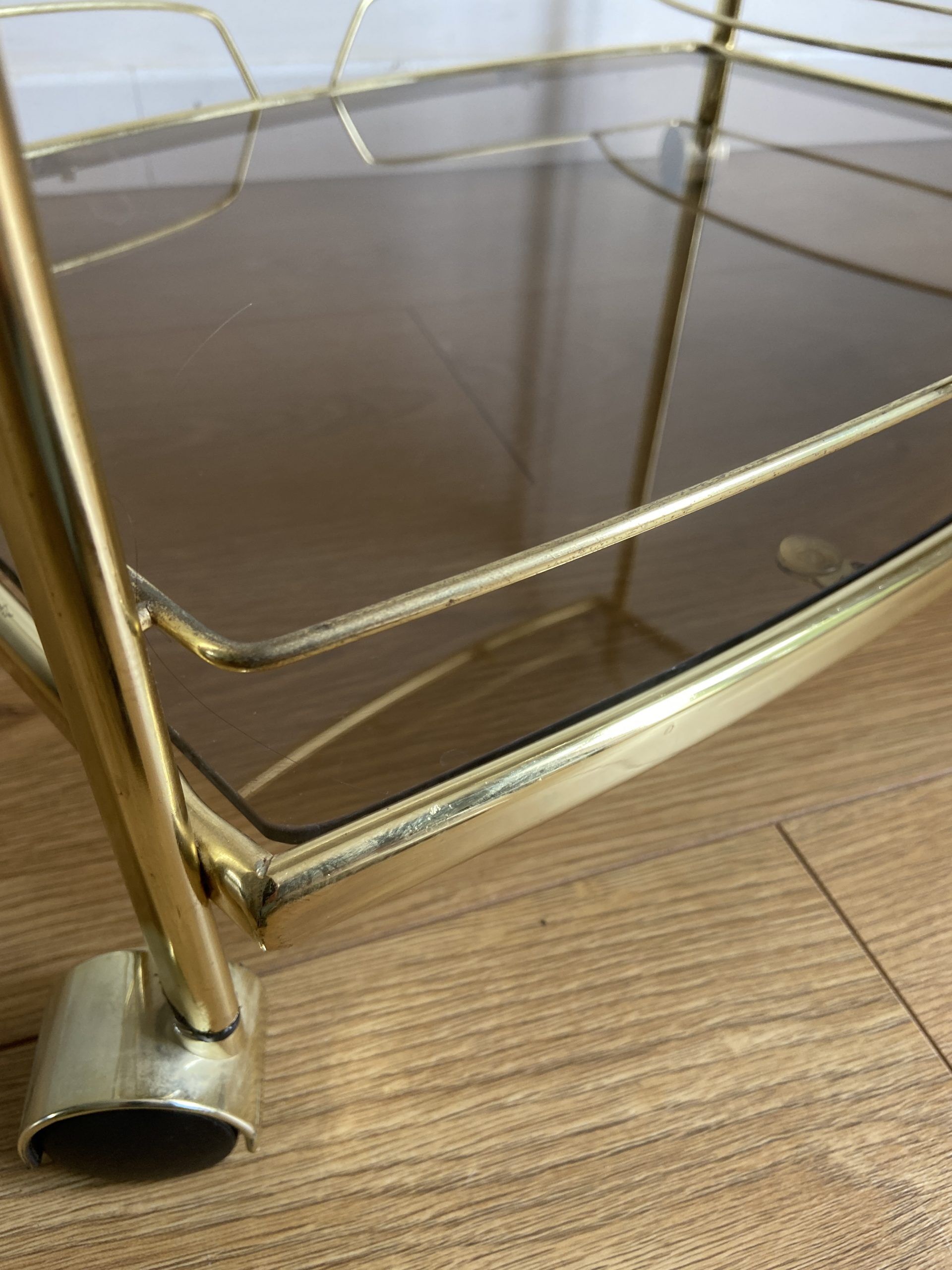 Vintage rolling service in gilded metal and smoked glass