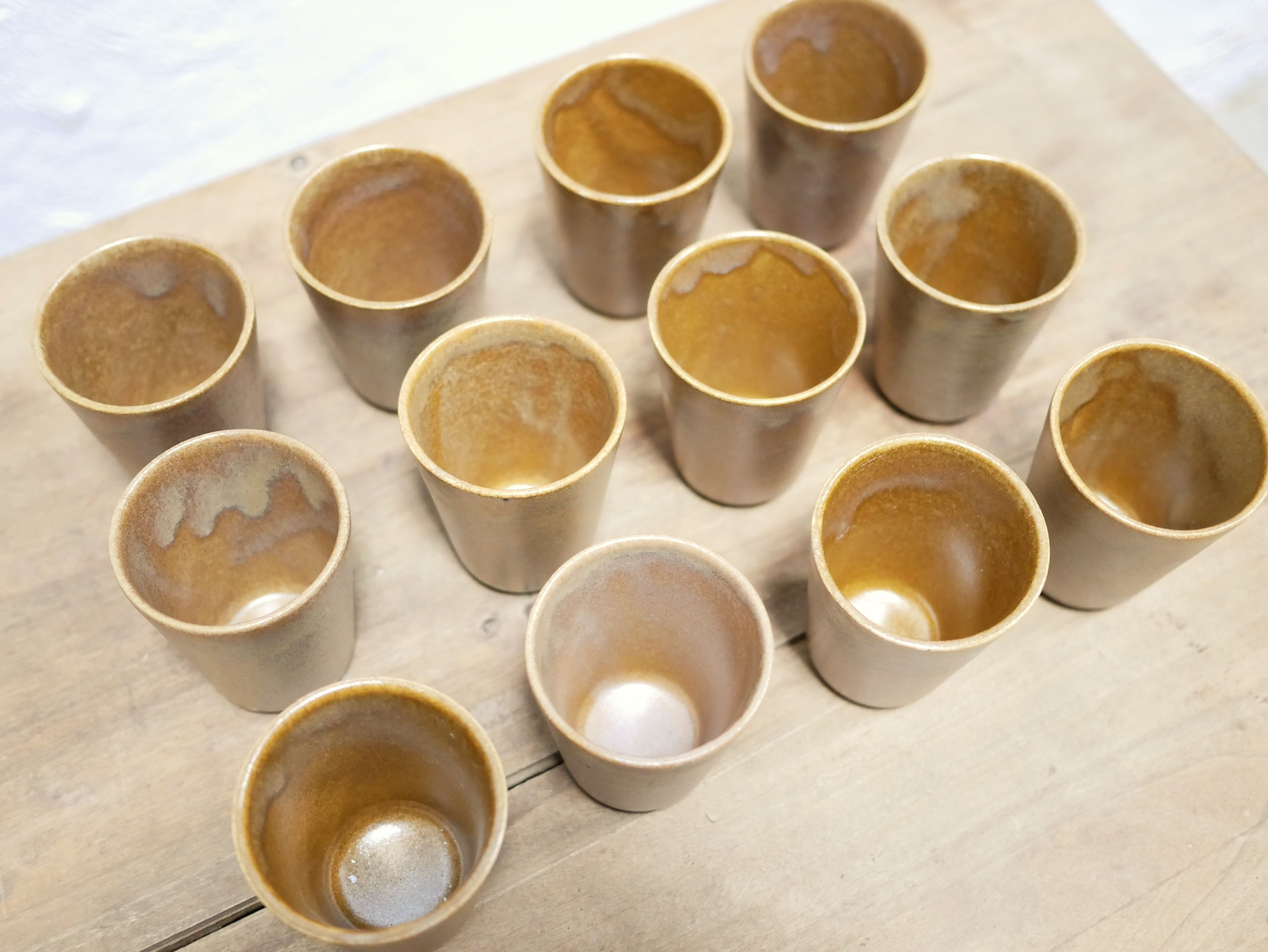 Series of 4 vintage stoneware glasses by the manufacture of Digoin, France