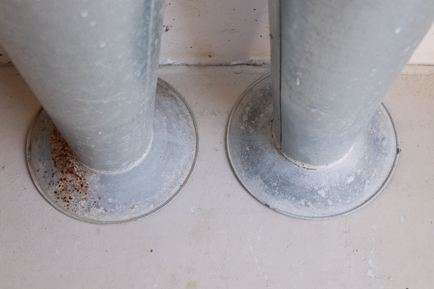 Pair of large zinc florist vases