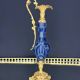 Cut blue crystal jug and gilded bronze, attributed to Baccarat.