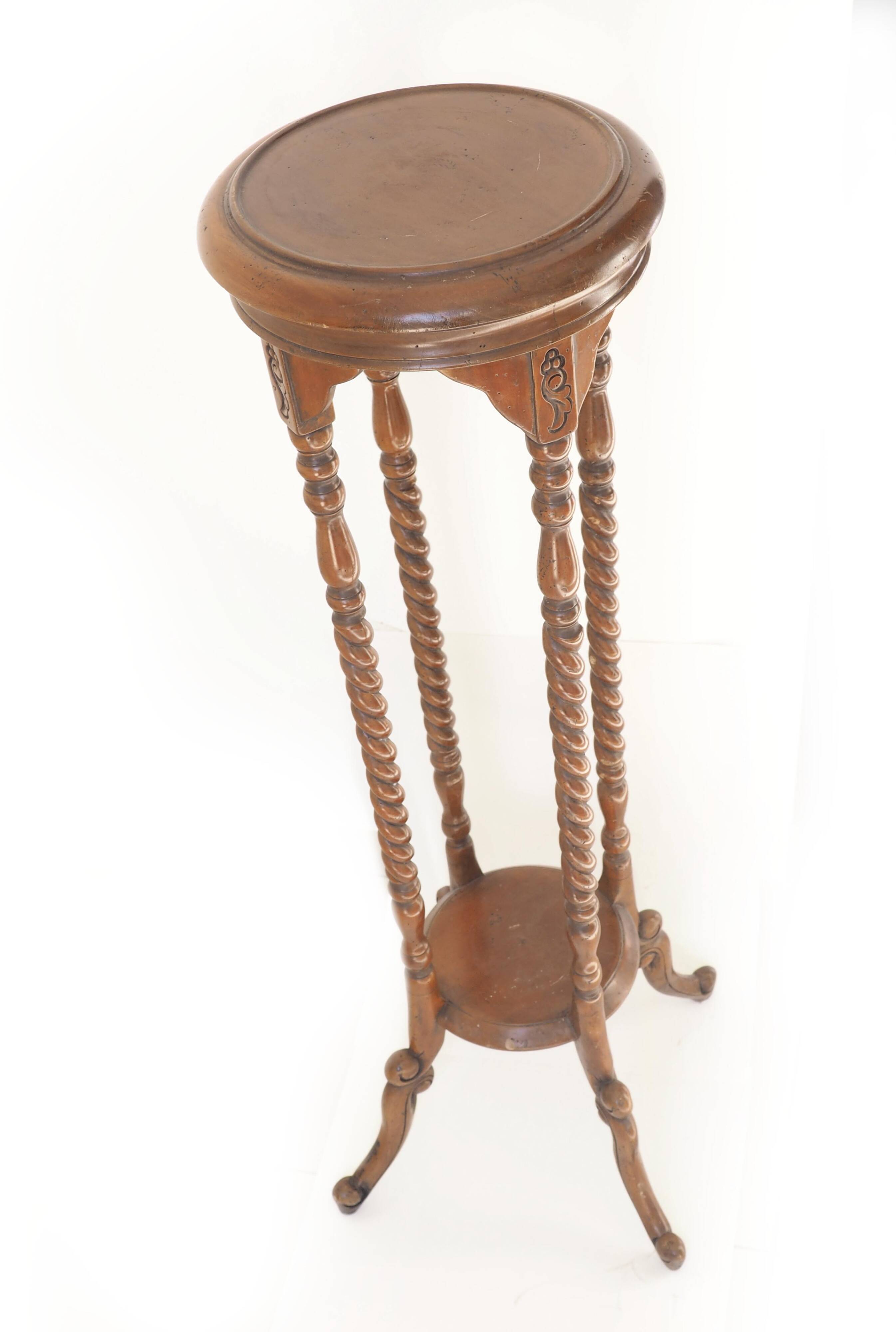 Turned cherry wood pedestal table