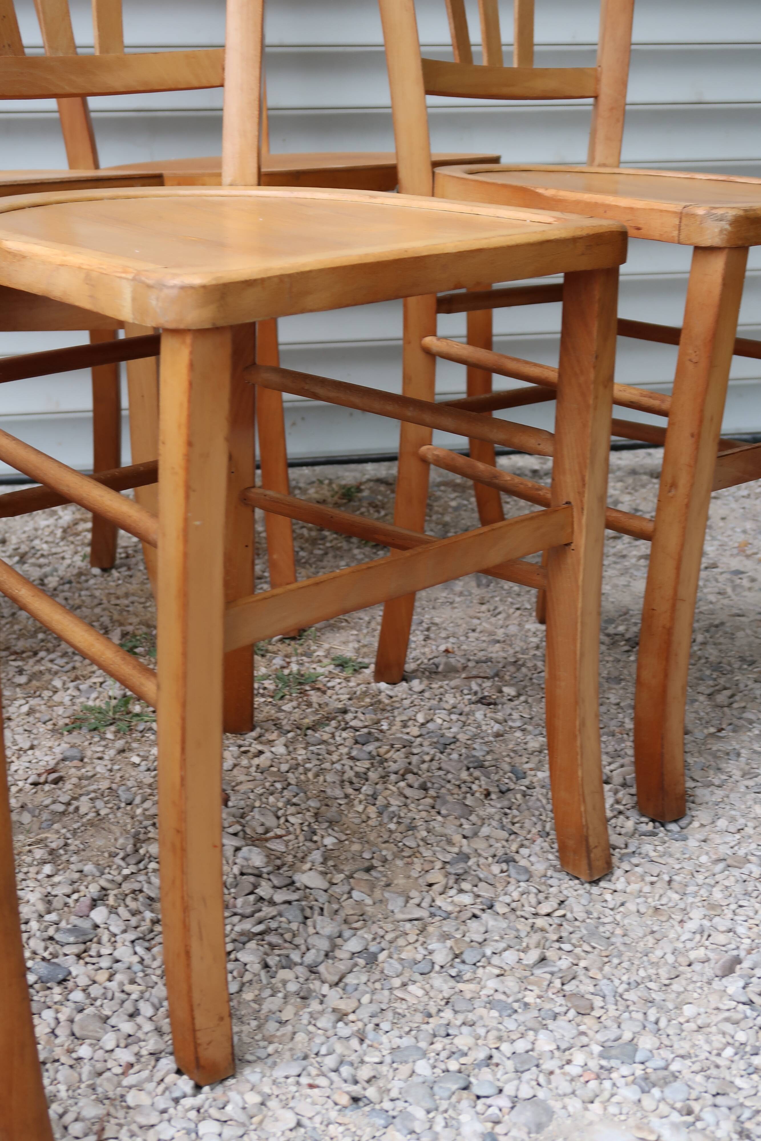Set of 7 mismatched bistro chairs