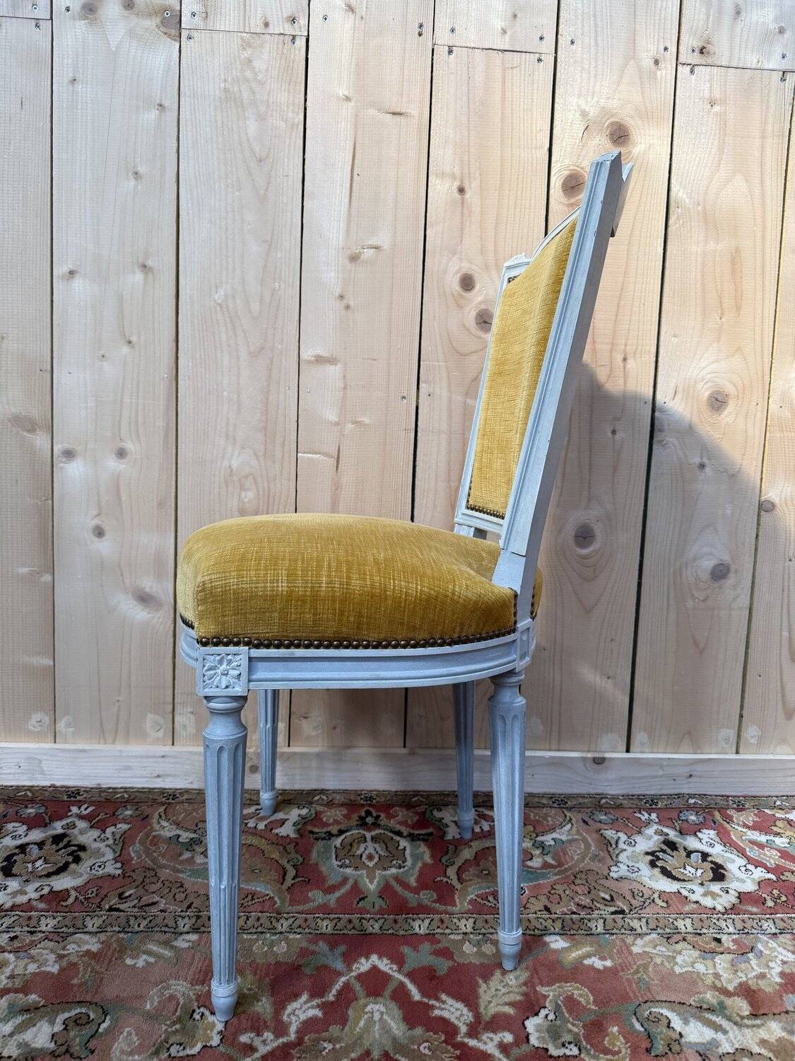 Set of 6 Louis XVI style chairs with polished wood and velvet.