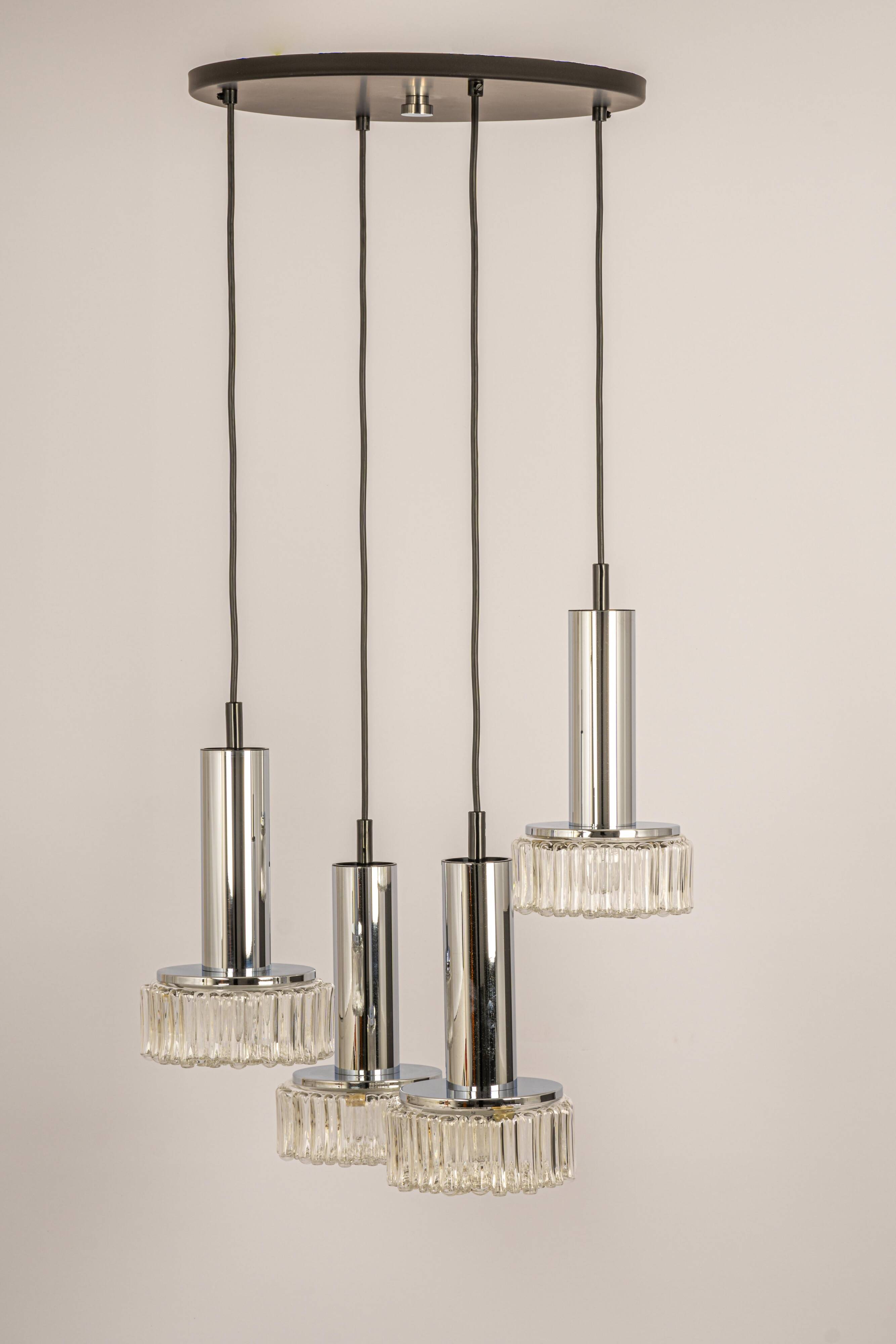 Large glass cascade chandelier designed for Staff Leuchten, Germany, 1970s.