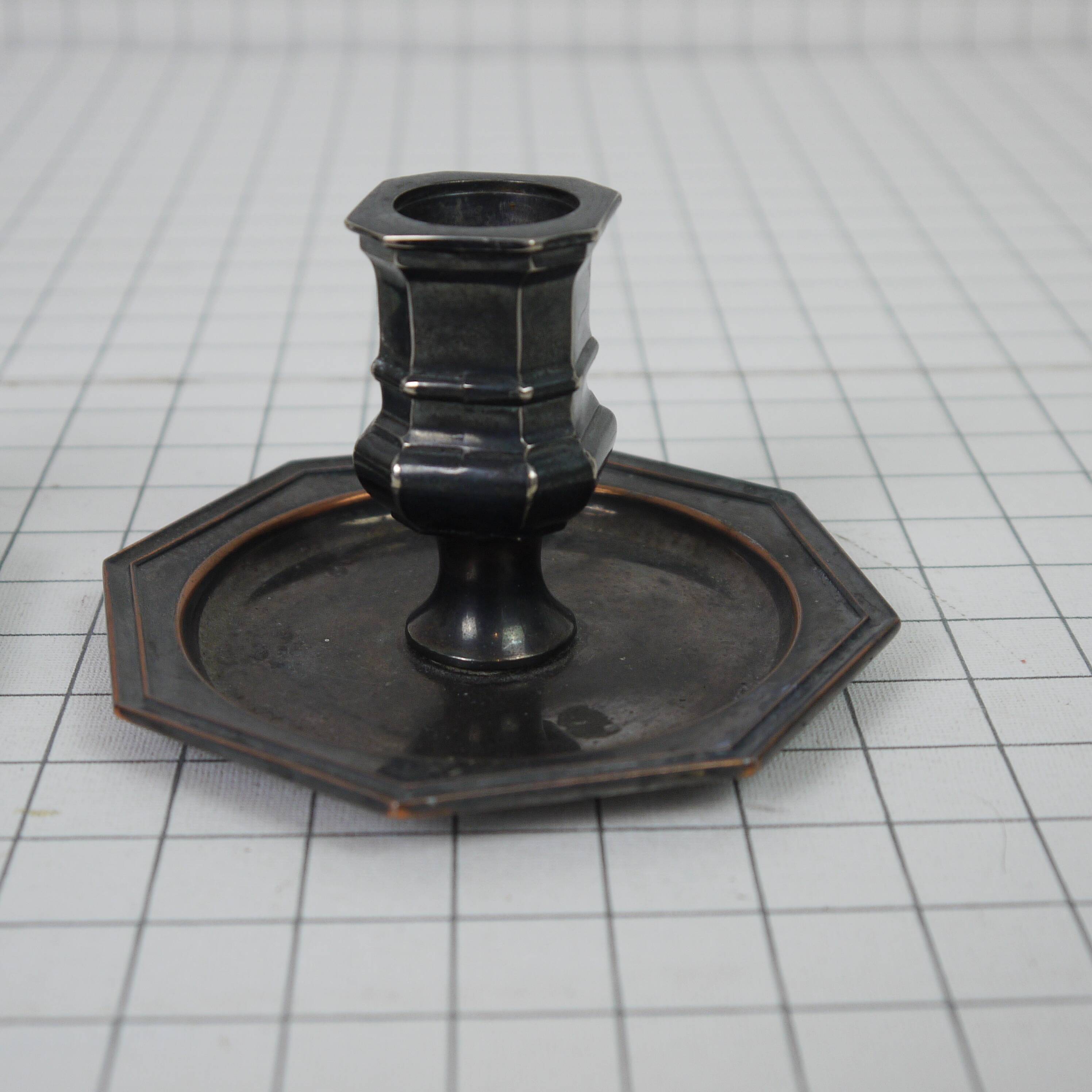 Pair of metal candlesticks